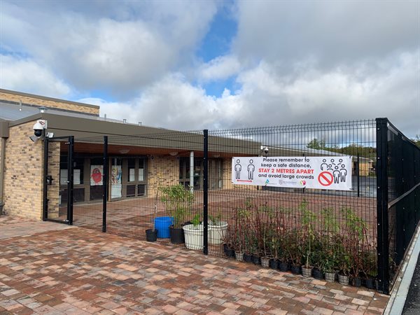 Bellsbank Primary School displaying a physical distancing banner