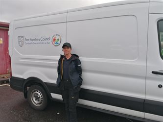 Gillian standing beside an East Ayrshire Council van
