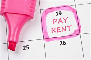 Calendar with the pay rent date highlighted in pink