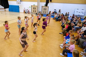 Mauchline CARS Summer School 2024 group dancing in school hall