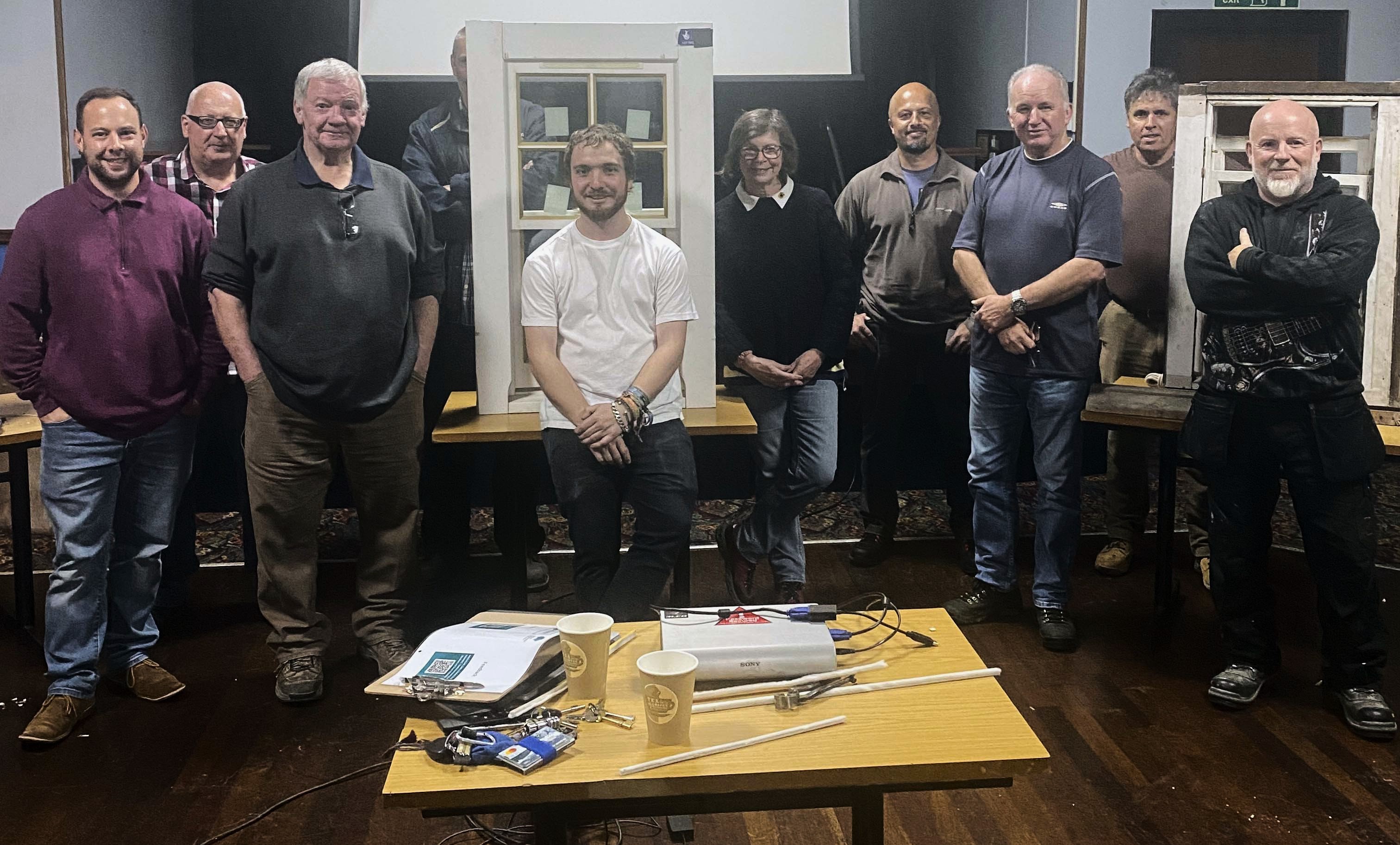 Group of people at traditional joinery for windows and doors