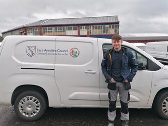 Michael standing beside an East Ayrshire Council van