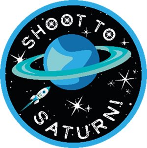 Rocket flying in space passing the planet Saturn, with the words 'Shoot to Saturn'