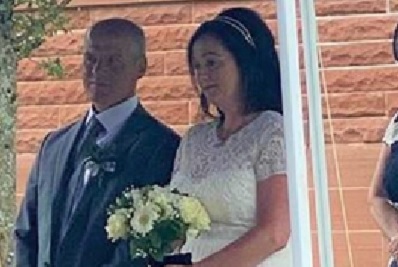 Bride and groom smiling at the Burns Monument Centre