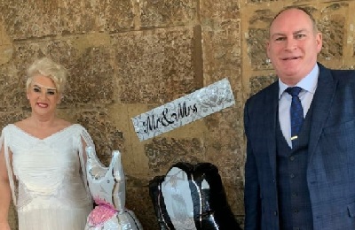 Bride and groom smiling